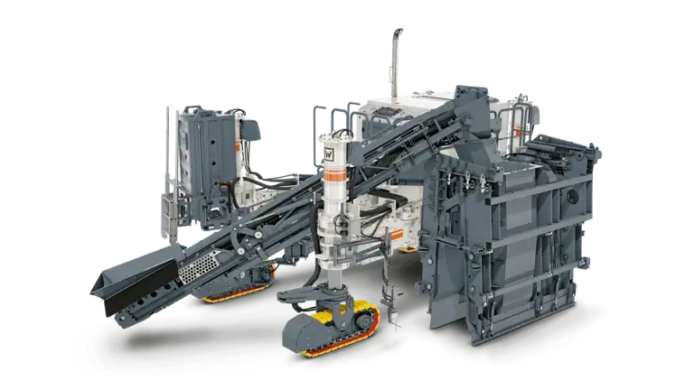 Industrial machine with multiple tracks and conveyors.